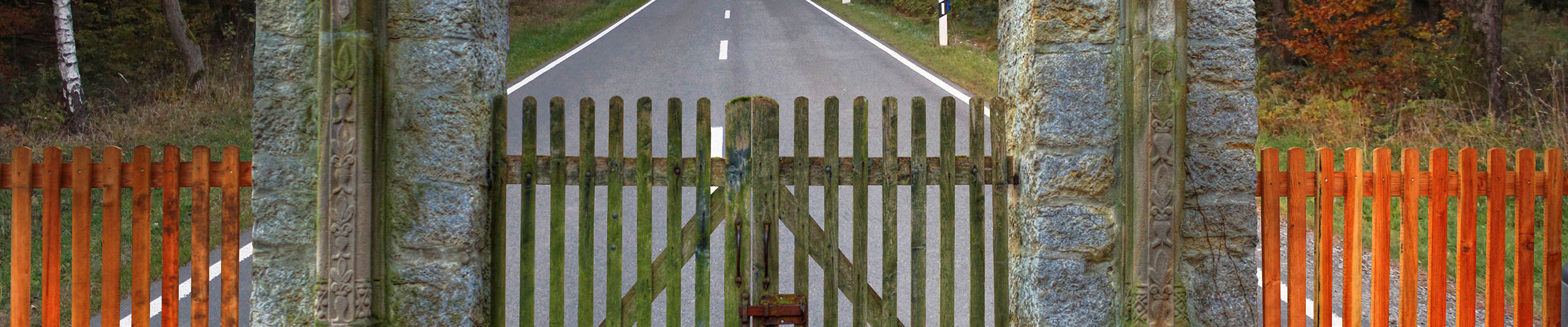 image of fence with lock and road ahead